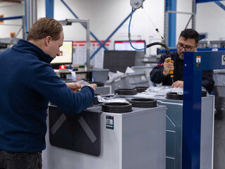 Recyled products from Zehnder two men working on zehnder reycled products