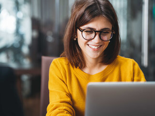 Code of Conduct E-Learning women siiting infront of PC training elearning code of conduct