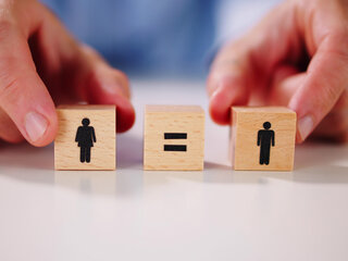Zehnder Gender Equality wooden squares with symbols women and men are the same